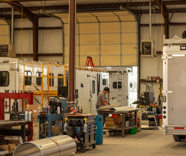 Sundowner trailer being inspected
